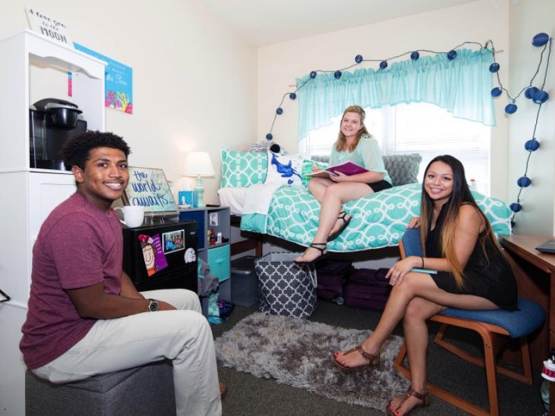 students at Armstrong university enjoy time in dorm