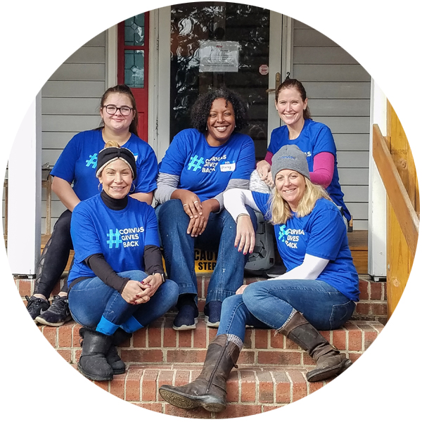 Group of Corvias employees volunteering and giving back,