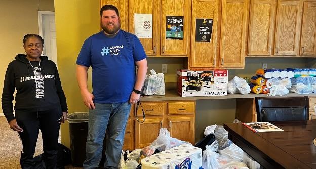 Maintenance Manager Tyler Wagner and Looking at the Whole Picture Foundation Executive Director, Janice Banks, deliver much-needed household items to Veterans in Detroit.