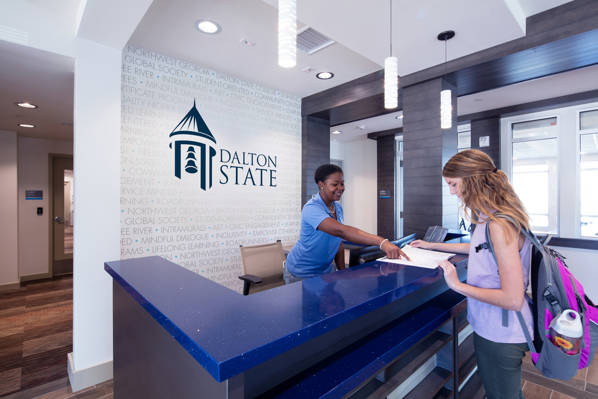 Student getting help at a service desk