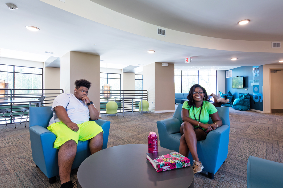 Two students sitting in a common area