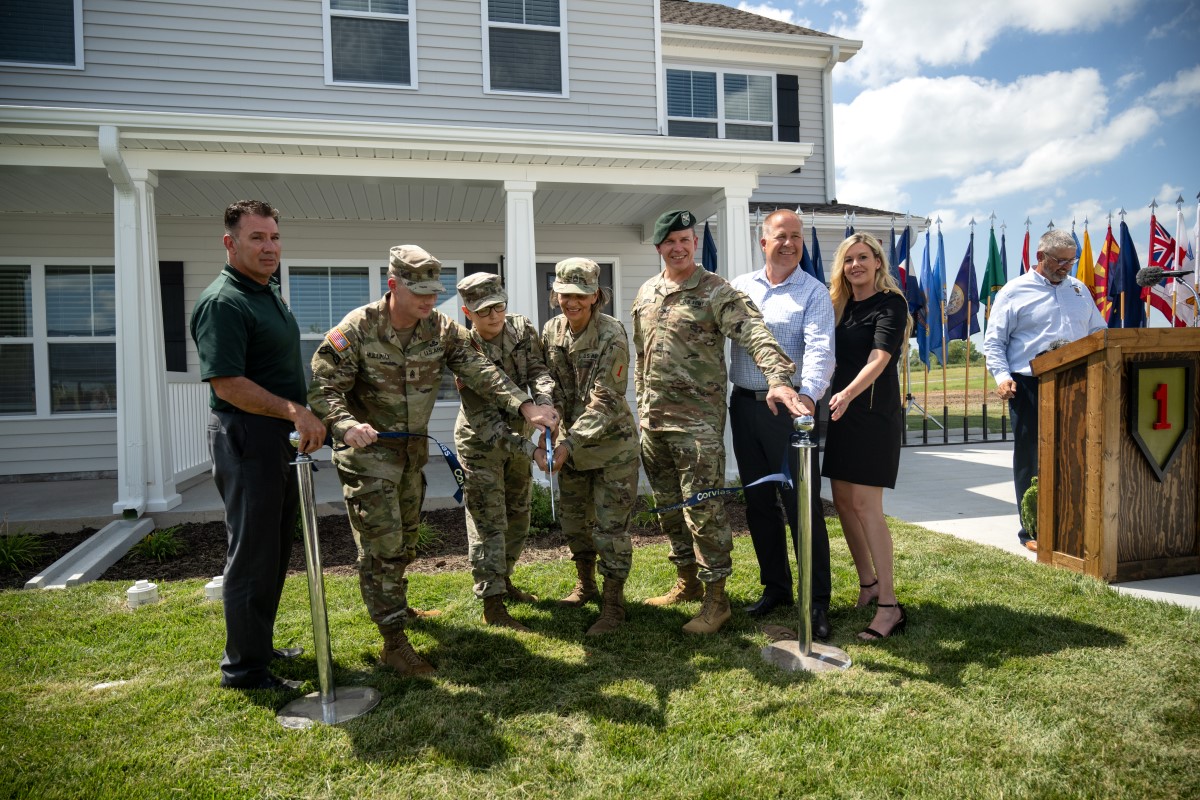 The ribbon cutting celebrated the completion of 52 new homes. Pictured left to right: Steve Milton, Fort Riley Army Housing Office Chief; Cmd. Sgt. Major Christopher L. Mullinax, Sgt. First Class Janet Godwin, Chief Warrant Officer Two Tatiana Santacruz, Garrison Commander Col. Michael Foote, Pete Sims, Managing Director DOD at Corvias; Kolby Stobbe, RVP Property Operations at Corvias.