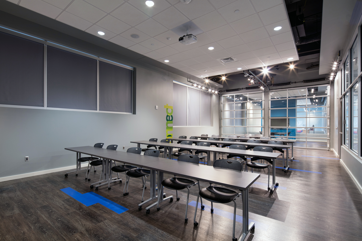 Large room with desks and chairs