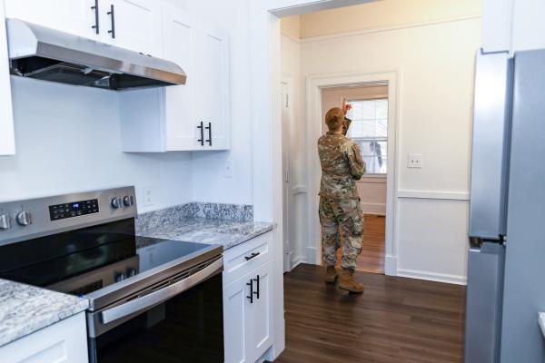 Soldier inspecting renovations