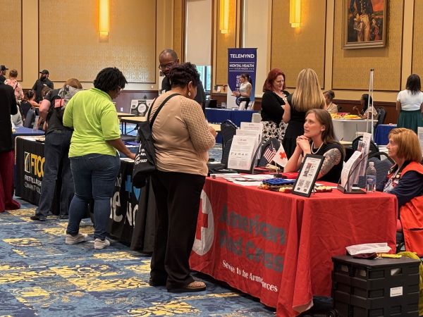 Fort Bragg families connected with local experts on college affordability, school support, military spouse employment and more at a community resource fair sponsored by Corvias Foundation.