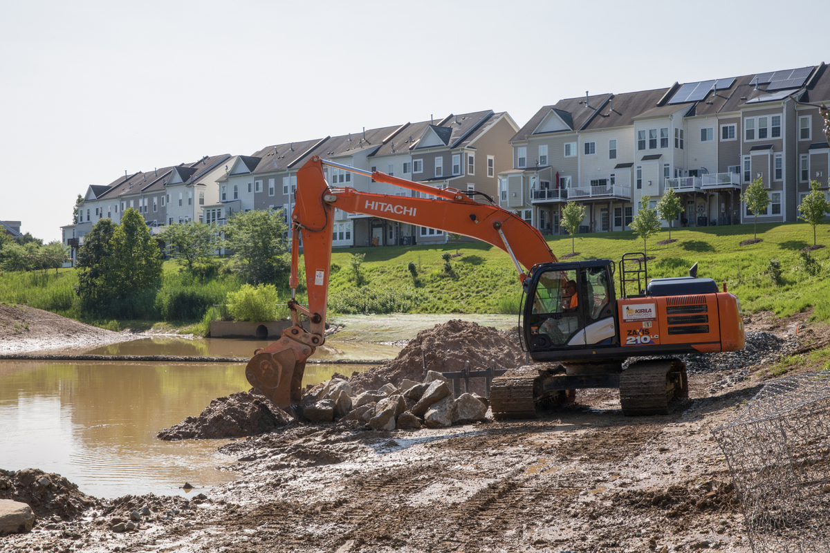 Construction teams work on pond restoration in Prince george's county