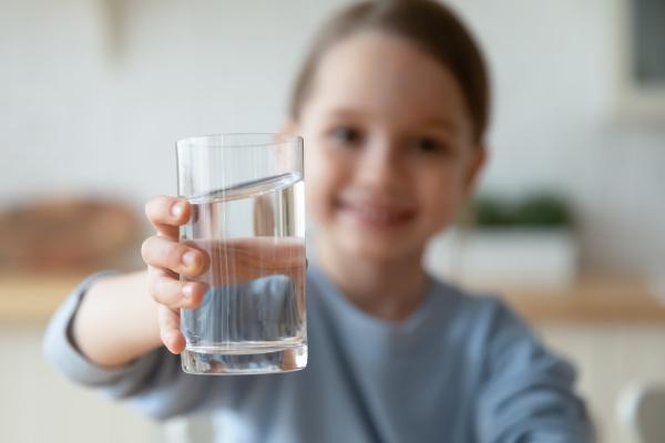 Girl with glass of water
