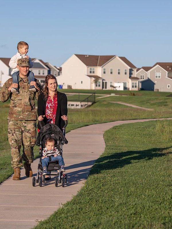 Military family walking through one of our neighborhoods
