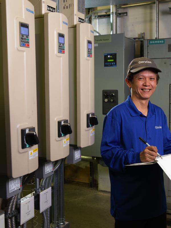 Corvias Maintenance Technician in an HVAC room