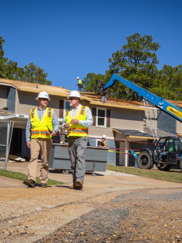 Men surveying a construction site