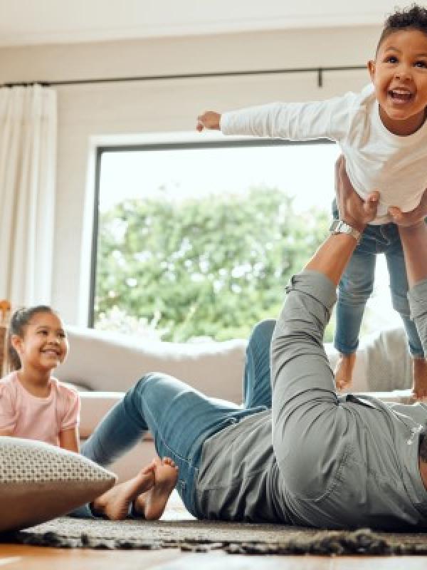 Family playing in living room