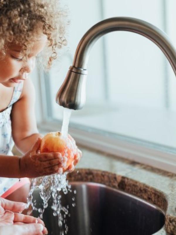 Girl Washing Apple