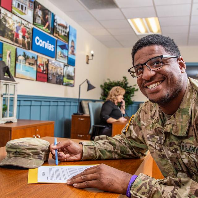 Soldier reviewing paperwork