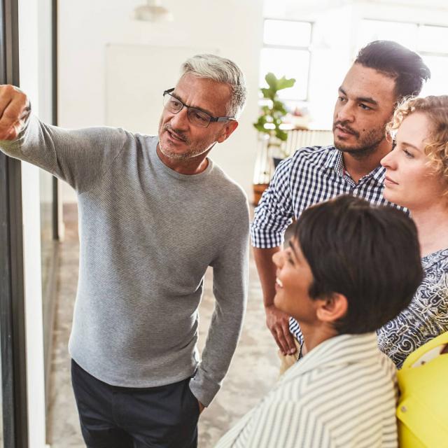 Group of people reviewing financial information