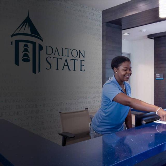 Student being helped at an information desk