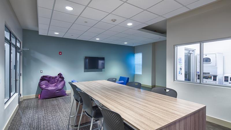 Common area with view of the laundry room