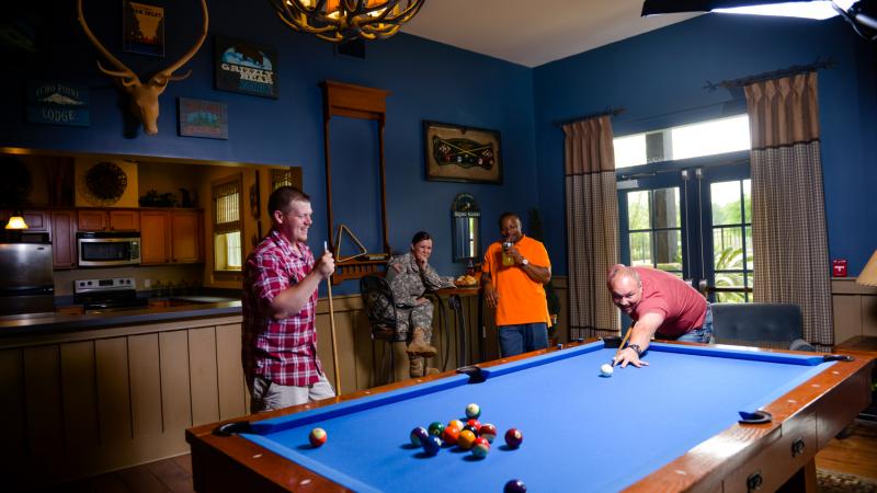 Soldiers enjoy the game room at one of our Community Centers