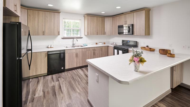 Kitchen of a newly renovated home using funds from our Solutions Investment project