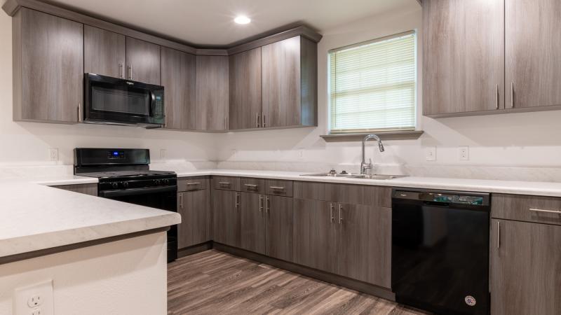 Kitchen of a newly renovated home using funds from our Solutions Investment project