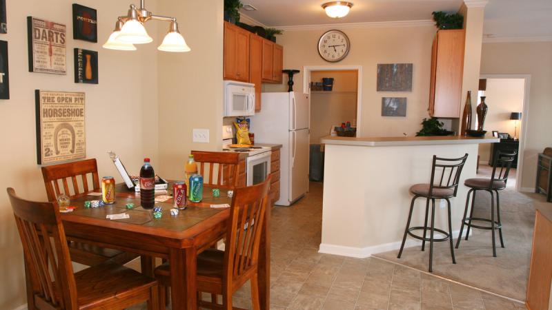 Inside of an apartment kitchen and dining area