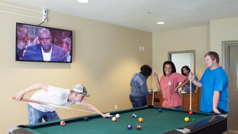 Students playing pool