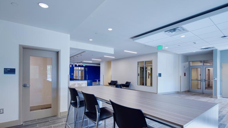 Open room with a table and chairs