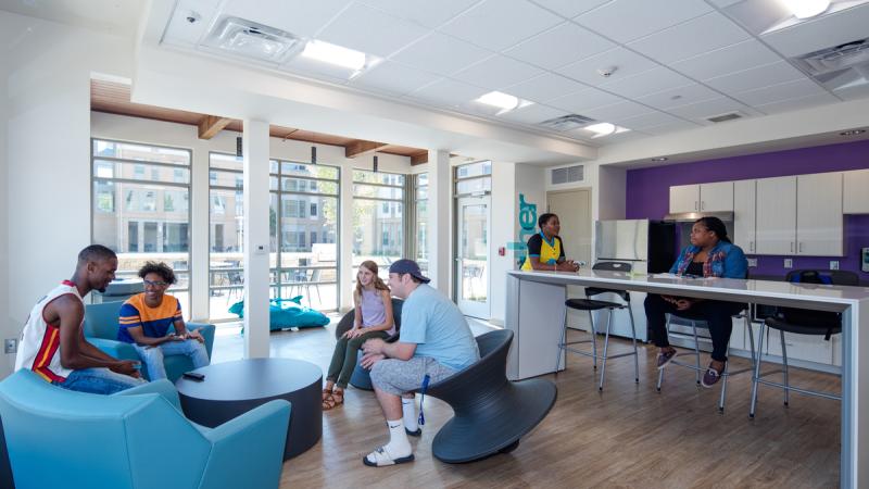 Students gathered in a community room