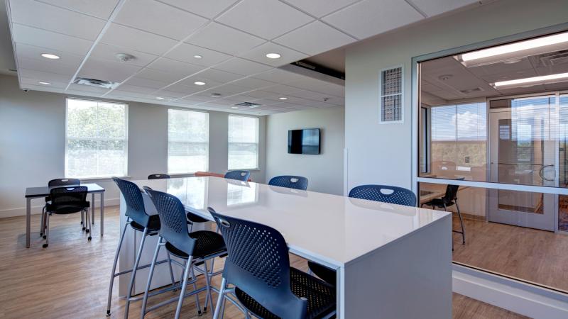 Open room with desks and chairs