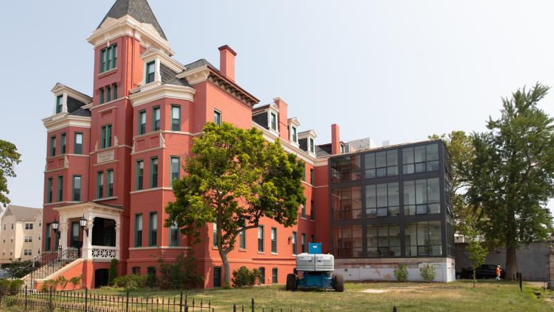 An older building that has been renovated into apartments