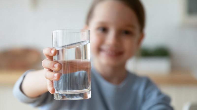 Girl With Glass of Water