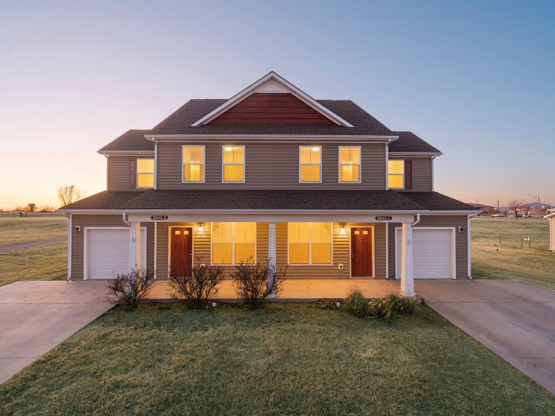 Outside of a duplex at sunset