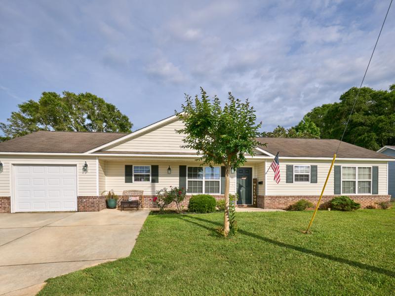 Outside view of a home with a garage and driveway