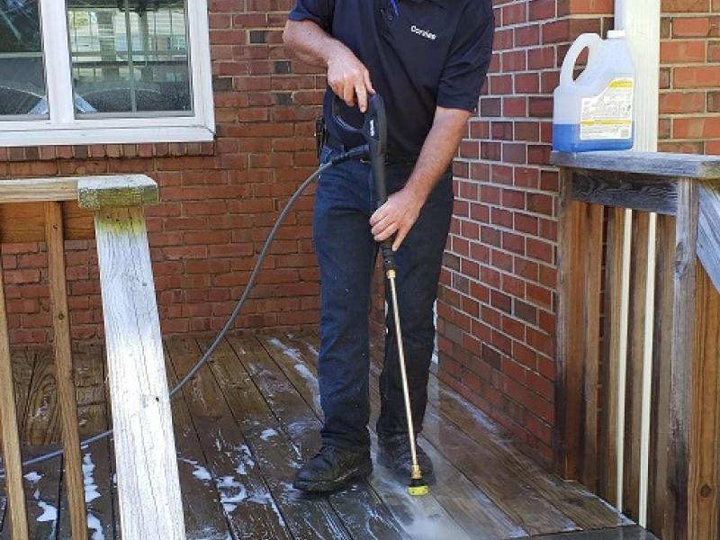 power washing deck at Fort Liberty