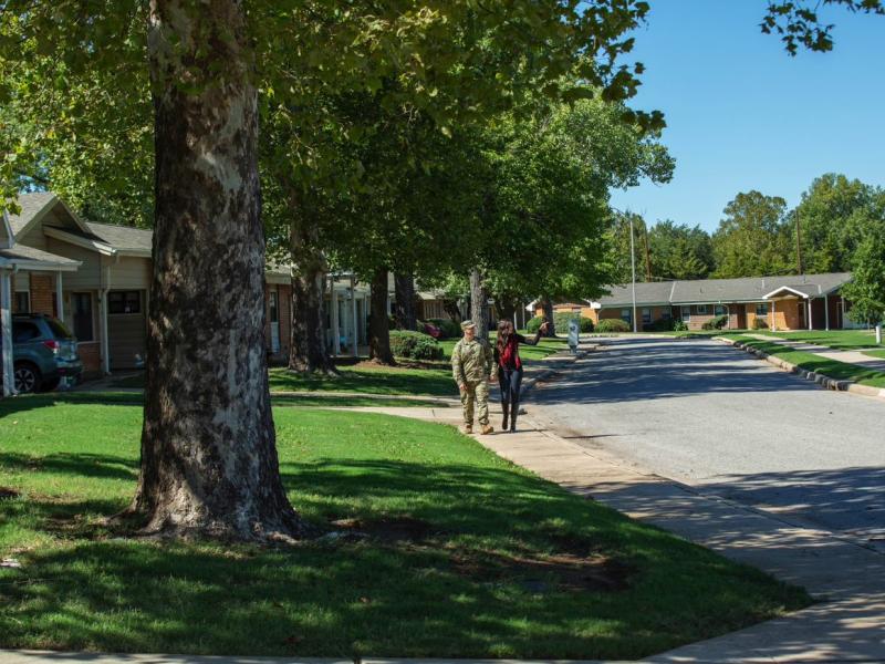 military couple walking down street at Fort Sill