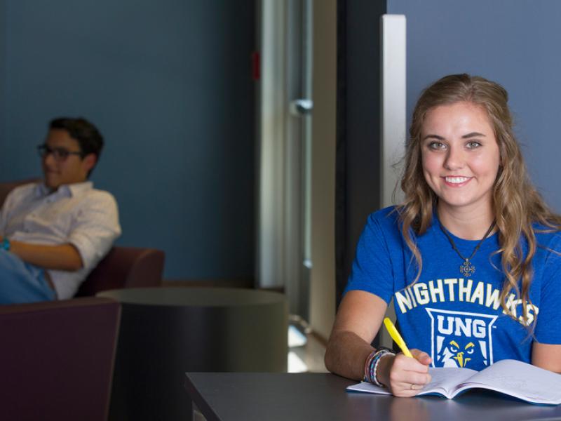 Girl doing school work at university