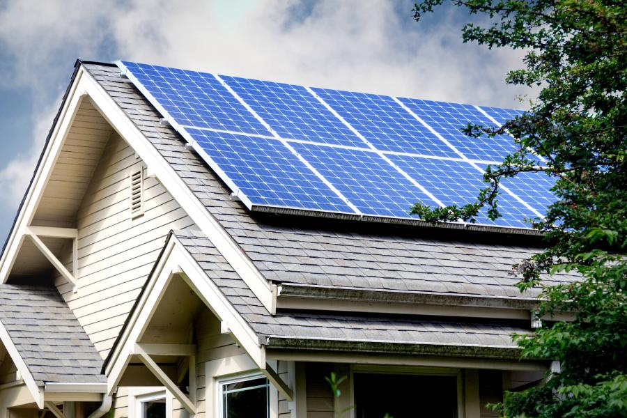 Solar panels displayed on rooftop of a nice home