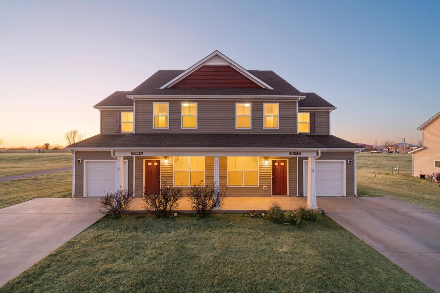 Outside of a duplex at sunset