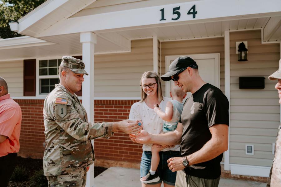 Fort Novosel family accepts keys to renovated home