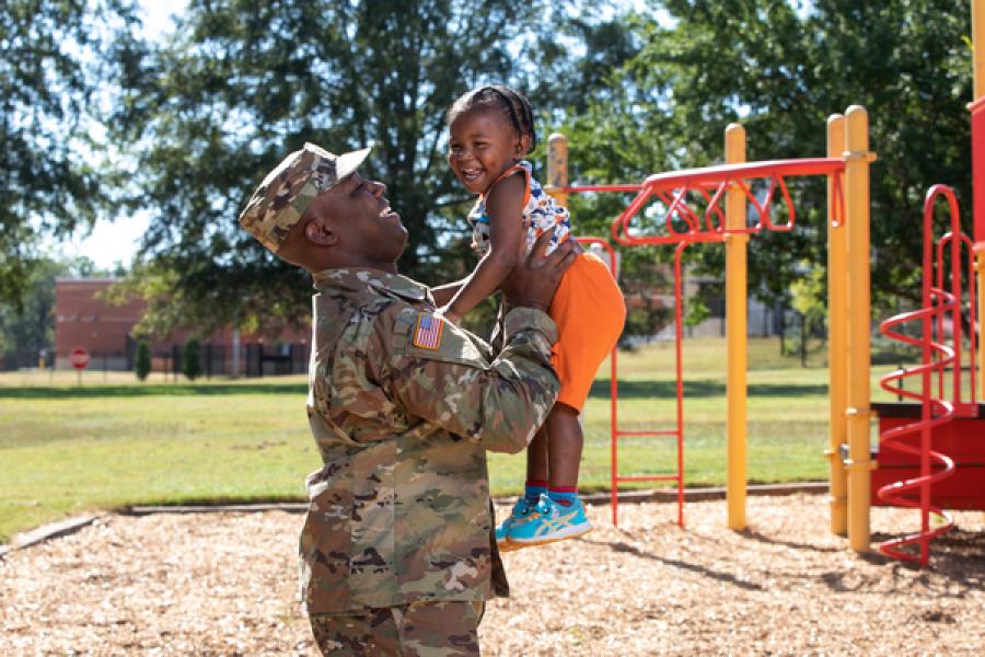 Military Dad Playing with Child