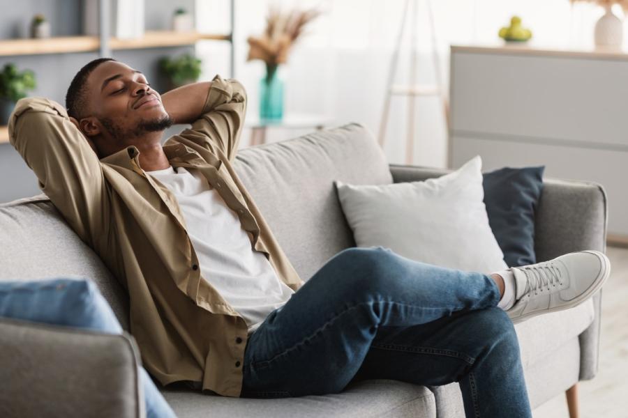 Man breathing clean air in healthy home environment