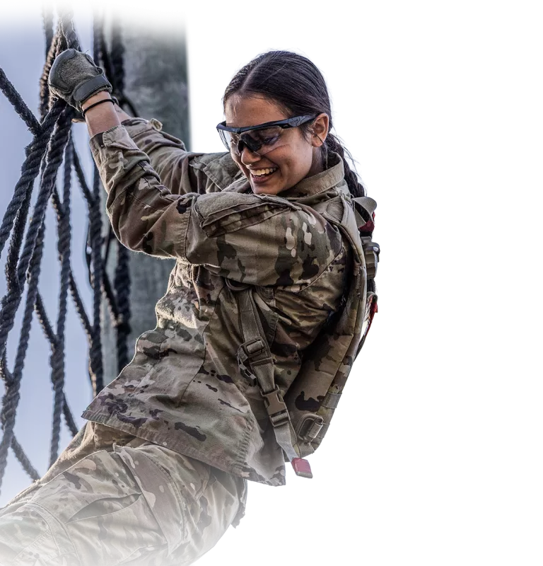 Woman Climbing on Rope Net