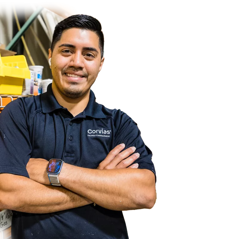 Man standing in front of work shelves