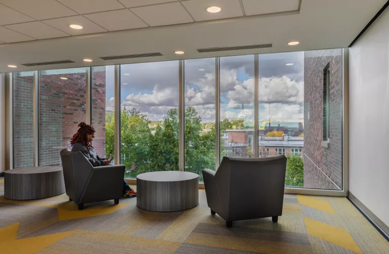 Student sitting in a chair 